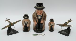 Three Royal Doulton Winston Churchill Toby jugs and models of Spitfire and Hurricane aeroplanes