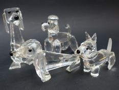 Four Swarovski Crystal dogs comprising dachshund, corgi, poodle and a stylised hound, largest 6.