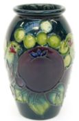 Moorcroft vase in Fruit and Finches pattern,