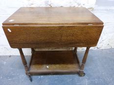 An oak tea trolley,