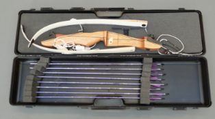 Lyons Inker Nature archery bow marked C4072112, with arrows,