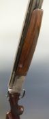 Lanber 12 bore over and under ejector shotgun with scrolling engraving to the lock,
