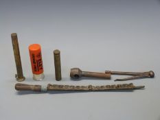 Six various gun related tools and accessories including a graduated bullet mould,