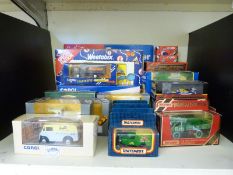 A collection of boxed Matchbox Models of Yesteryear, Corgi including Weetabix special edition,