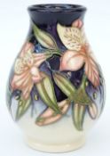 Moorcroft vase of squat form in Peruvian Lily pattern by Sally Tuffin, 9.