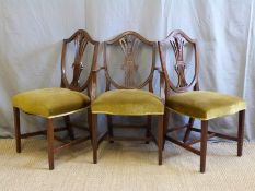 A set of ten upholstered mahogany dining chairs (8+2)