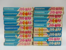 Eighteen Waddington's Jig-Map jigsaw puzzles,