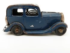 Tri-ang Minic clockwork tinplate Ford Saloon with blue body and black tyres