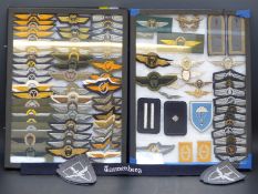 Two displays of post-WWII German Air Force insignia