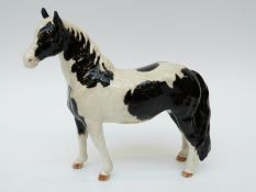 A Beswick piebald horse