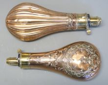 Two G & J W Hawksley copper and brass powder flasks both with ornate embossed decoration,