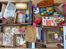 A very large collection of children's toys and games including spinning top, building blocks etc.