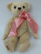 Merrythought Alpha Farnell Teddy bear with blond mohair, pink ribbon, growler and jointed limbs,