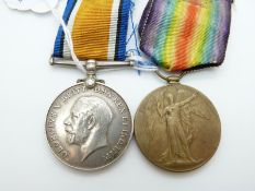 WWI medal pair comprising War and Victory medals named to 136061 Gunner S J Caunter Royal Artillery