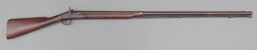 Percussion hammer action gun with indistinctly named, possibly Harris, and engraved lock,