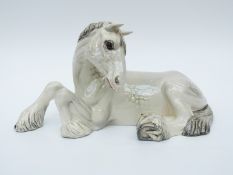 Beswick grey Shire horse lying down
