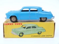 Dinky Toys diecast model Studebaker Land Cruiser with blue body and fawn hubs 172, in original box.