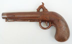 A Fulham Pottery stoneware spirit flask in the form of a pistol,