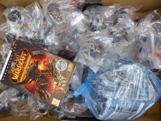 A very large collection of World of Warcraft painted action figures and related cards,