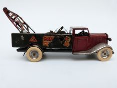 Tri-ang Minic clockwork tinplate Minic Recovery Lorry with maroon cab, dark green body, cream tyres,