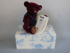 Steiff Teddy Bear Sommelier with bordeaux mohair, blue waistcoat and bow, bottle of wine,