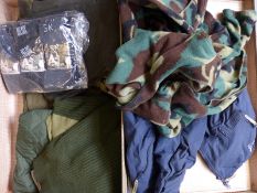 A collection of sporting/ outdoor clothing in a case including a waxed jacket, unopened items,