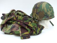 Kevlar camouflage helmet with two British camouflage jackets and one pair of camouflage trousers.