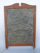 An Arts and Crafts pewter hammered panel,