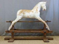 A Victorian Lines Bros wooden rocking horse on swing stand, stamped to the metal joint, LB Ltd SP3,