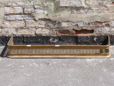 A brass pierced fender,