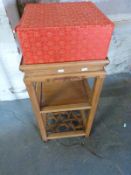 A Chinese bedside table with shelf below and an Eastern box,