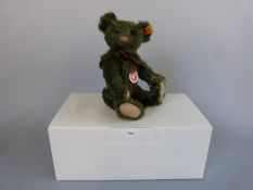 Steiff Classic Teddy Bear with green mohair, brown ribbon and jointed limbs, 28cm tall,