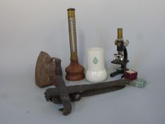 A quantity of collectibles to include animal trap,
