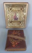A religious icon and a carte de visite photograph album