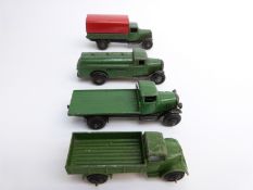 Four pre-war Dinky Toys diecast model lorries including Perol Tanker, Flatbed etc.