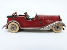 Tri-ang Minic clockwork tinplate Tourer Car with red and chrome body, wooden seats,