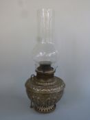 An oil lamp impressed 'The Rochester'