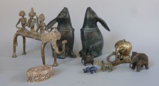 A pair of bronze stargazing rabbits together with various tribal and similar items