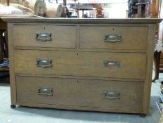 An oak chest of two over two drawers W107 x D50 x H68cm