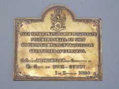 Embossed brass 'Take notice that as from today's date poachers shall be shot on first sight and if
