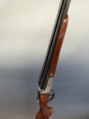 Gunmark Kestrel 12 bore side by side shotgun with named and engraved locks, engraved top plate,