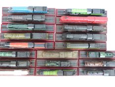 Twenty-nine approximately 00 gauge railway locomotive models on named wooden bases