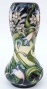 Moorcroft waisted bud vase in Iris pattern, 16cm tall,