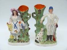 Two 19thC Staffordshire figural spill vases,