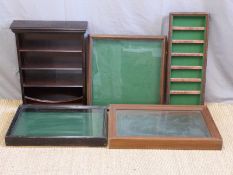 Five shotgun cartridge display cabinets and shelves,
