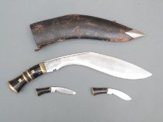 WWI style kukri knife in leather covered wooden sheath with karda and chakmak,