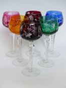 A harlequin set of six cut glass hock glasses