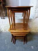 Two nests of tables including a retro set