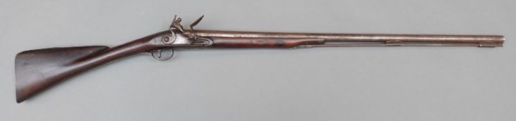 Daykin 18 bore flintlock hammer action sporting gun with named and engraved lock, iron butt plate,