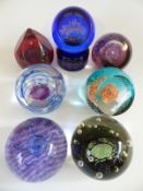 Seven Caithness Glass limited edition paperweights,